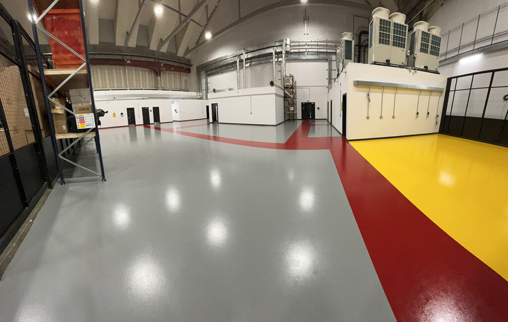 Factory flooring installation in Watford with epoxy floor